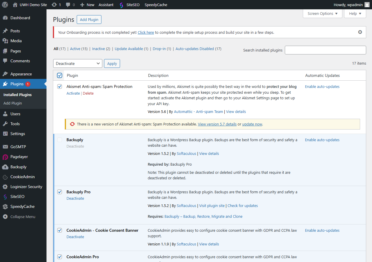WordPress Installed Plugins screen with all plugins selected and the Deactivate bulk action chosen